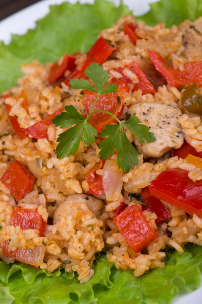 istock Rice with vegetables and chicken in a curry sauce 857777696