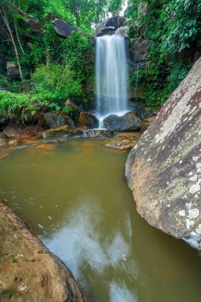 istock Beautiful waterfall in green forest in jungle, Thailand 857779098