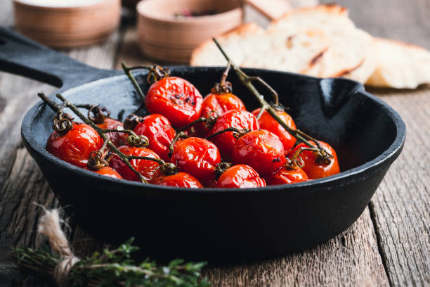 istock Roasted cherry tomatoes in cast iron skillet 857786924