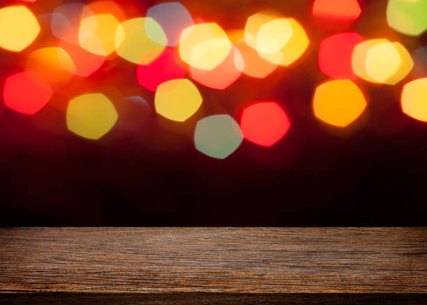 istock Empty wooden top table and blurred colorful bokeh light background 857789110