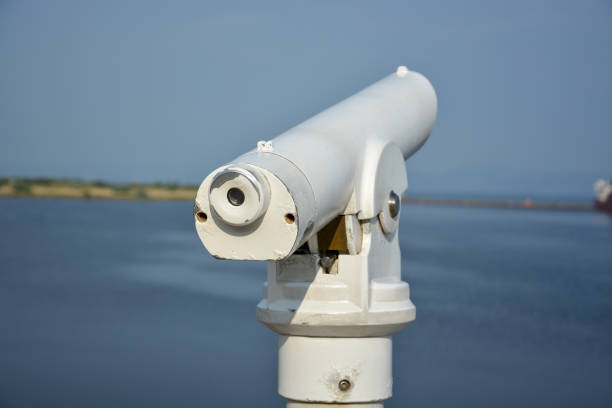 istock A white telescope on a ship in the sun close up 857789330