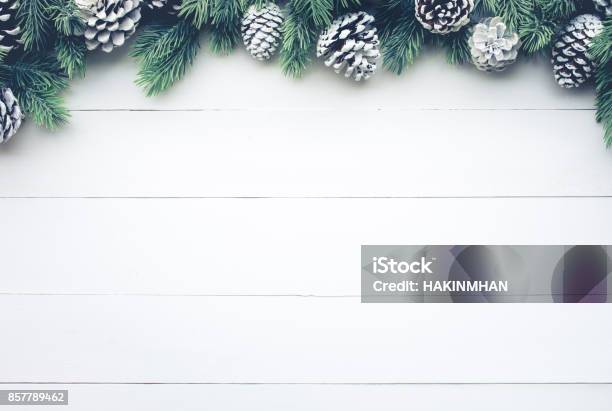 Christmas Fir Tree With Pine Branch Decoration On White Wood Stock Photo - Download Image Now