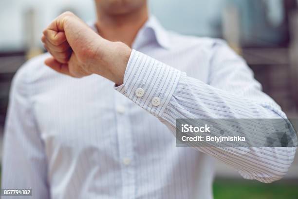 Close Up Of A Businessman In A White Shirt And Shows The Sleeve Stock Photo - Download Image Now