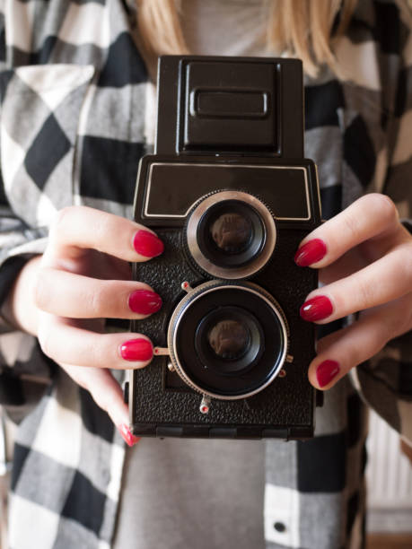 istock Female Holding a Vintage Camera 857798166