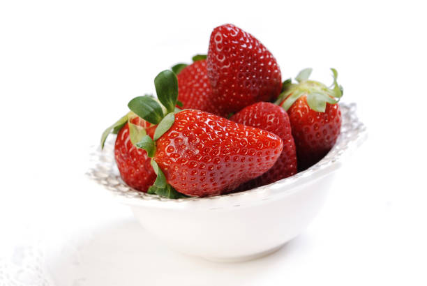 istock Fresh strawberries in the small ceramic bowls 857802040