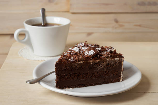 istock Slice of dark chocolate truffle cream cake 857805594