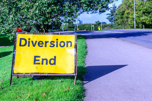 istock Diversion end sign on pedestrian footpath uk road 857805682