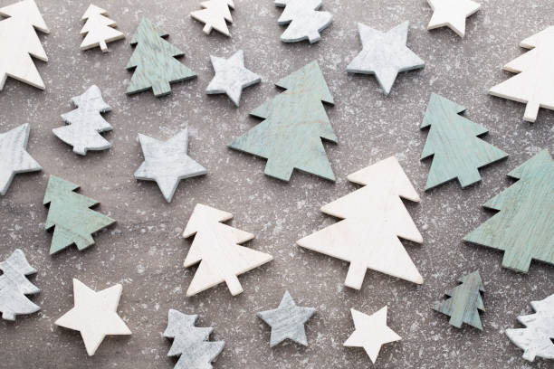 istock Christmas wooden decor on the snow background. 857809050