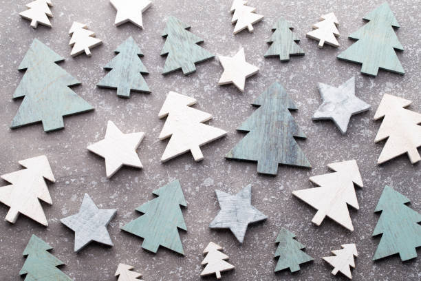 istock Christmas wooden decor on the snow background. 857809546