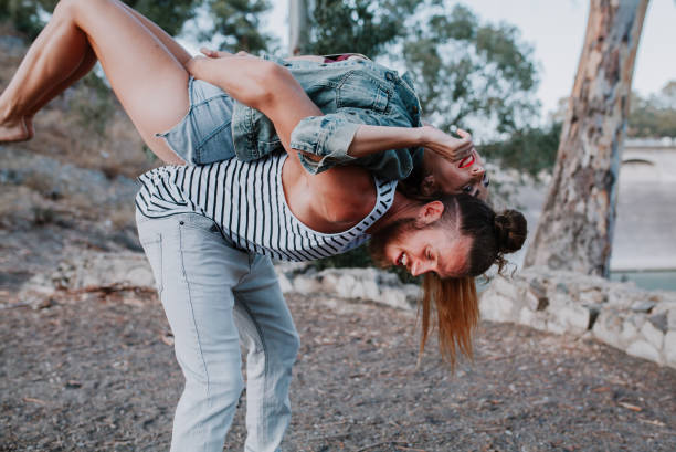 istock Happy couple having fun in nature. 857815104