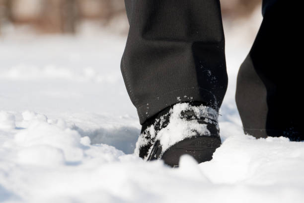 istock winter shoes in snow 857821102