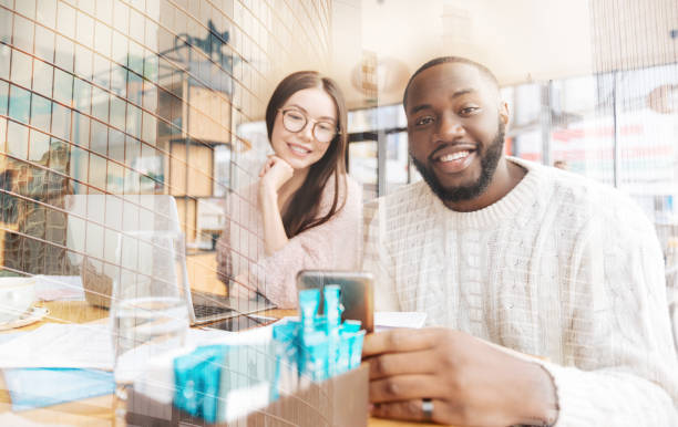istock Close up of smiling positive friends 857825664