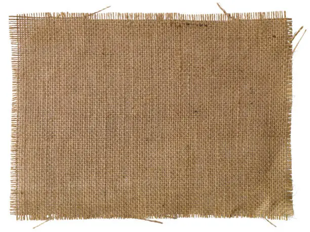 Photo of Patch of natural burlap fabric background.