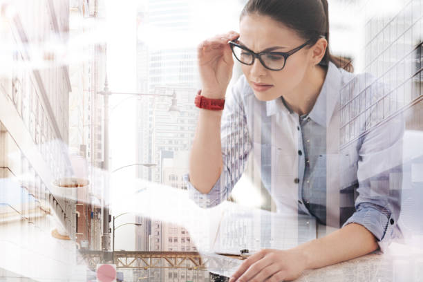 istock Concentrated woman working in the office 857833102
