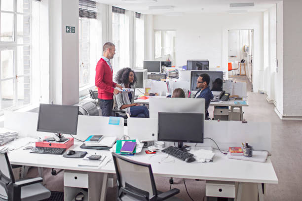 istock Business people discussing in new office 857834234