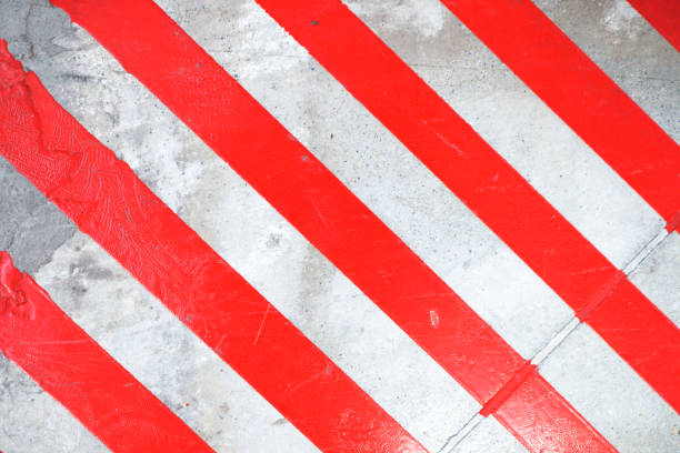 istock Abstract concrete textured background with Red lines 857839004