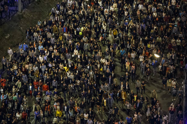 istock Crowd of walking people, top view 857840684