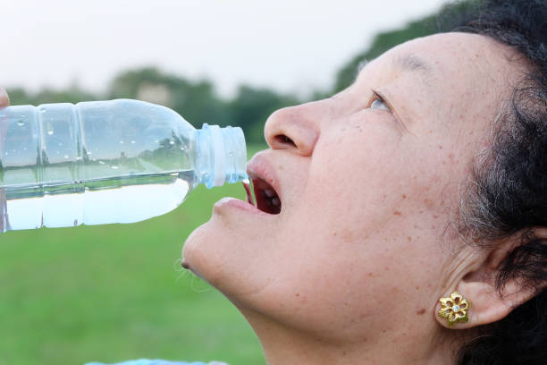 istock Asian Senior woman drinking water 857841858