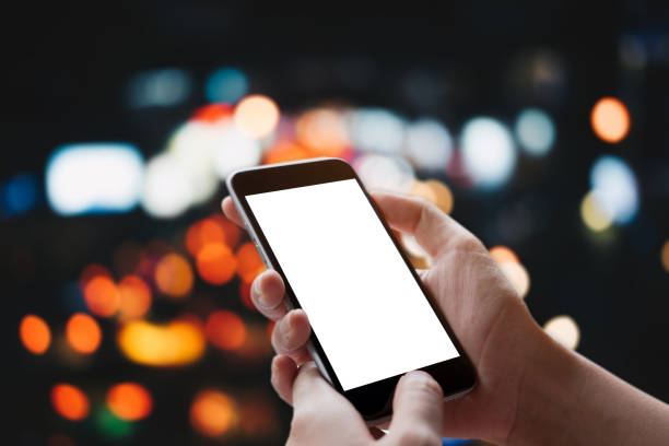 istock Close up Woman hand Using a Smart Phone with light bokeh background 857842000