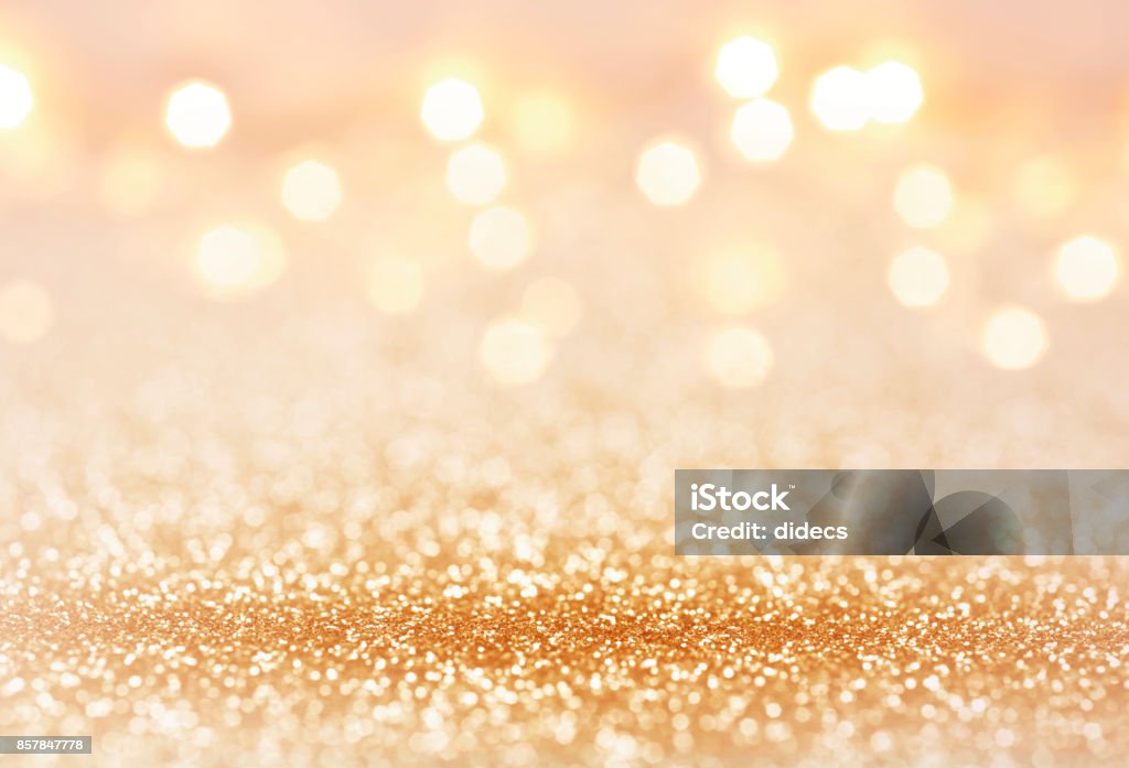 Golden color abstract glitter texture background for holidays Backgrounds Stock Photo