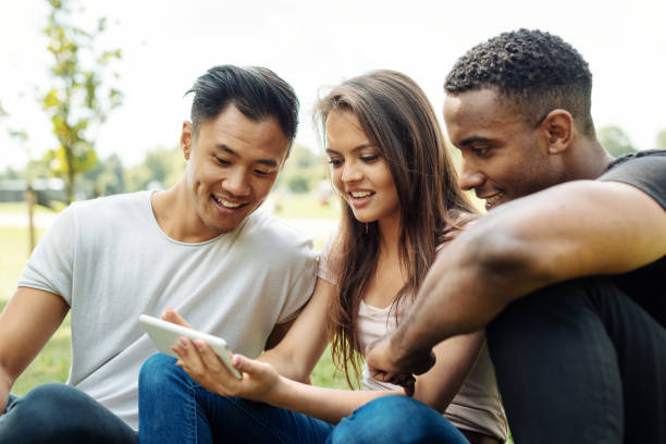 istock Group f friends from all around the globe sitting together 857852110