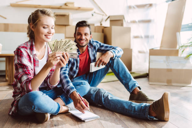 istock young couple counting money 857853752