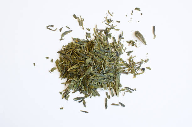istock spilled green tea leaves 857865412
