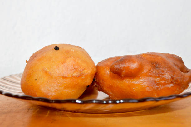 istock Donuts malagasy : menakely and makasaoka 857869332