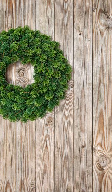 istock Christmas wreath decoration rustic wooden background 857870296