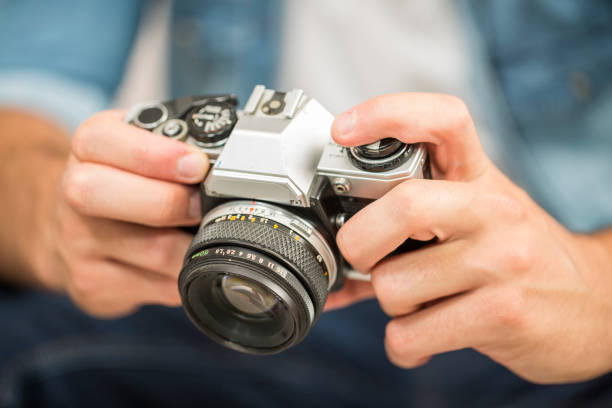 istock Student photography with a vntage camera 857873458