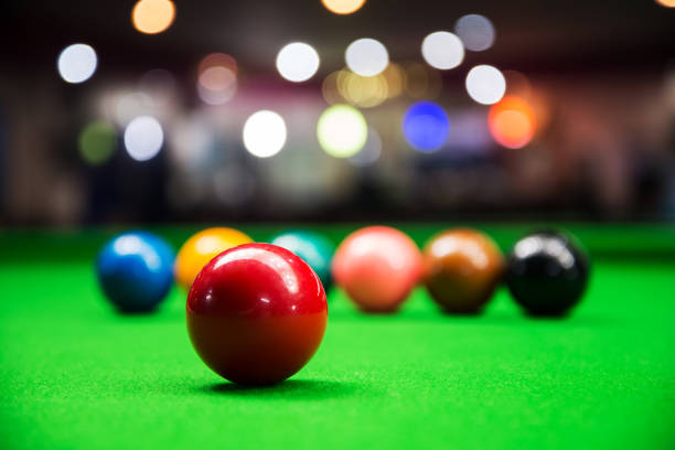 istock Red snooker ball on snooker table 857877282