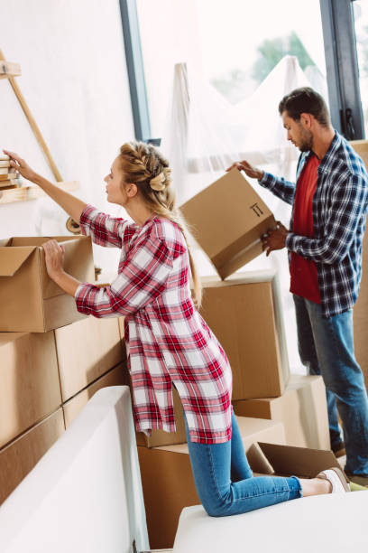 istock couple moving in new house 857877550