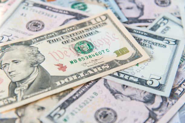 istock Set of american dollar bills as background 857877666
