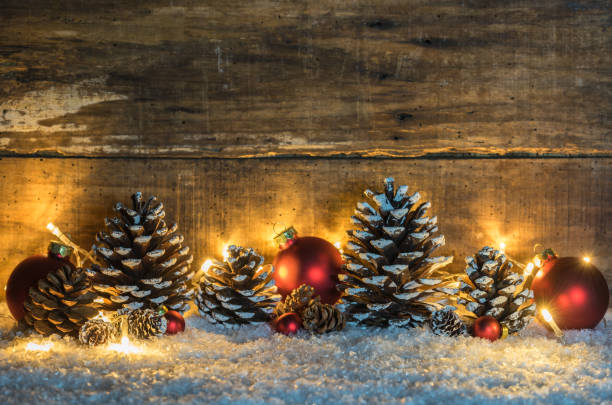 istock Rustic Christmas background with natural decoration and light 857881020
