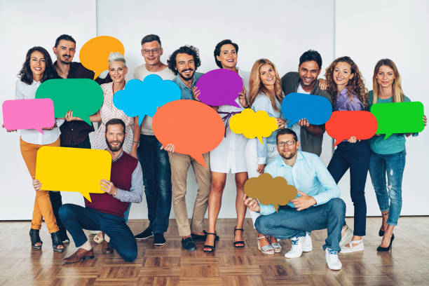 istock Large group of people with colorful speech bubbles 857881246