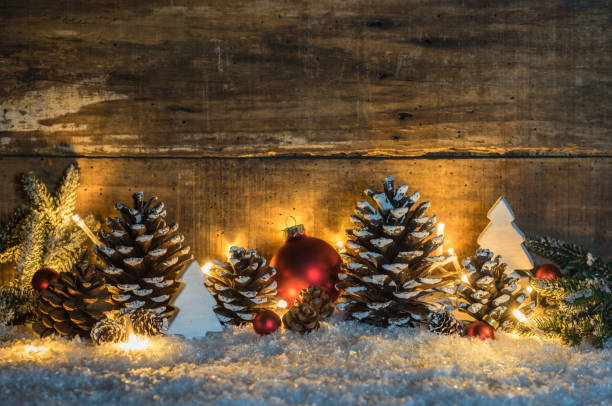 istock Rustic Christmas background with natural decoration and light 857881644