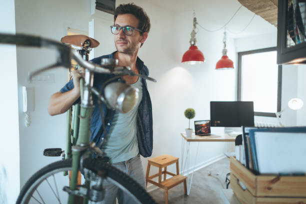 istock Young man coming to his workplace 857885098