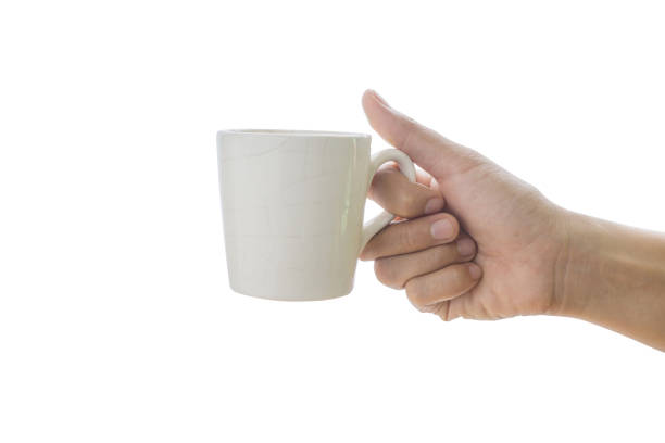 istock Woman hand is holding a white coffee cup 857891918
