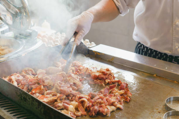 istock Chef is stirring beacon for american breakfast 857897736