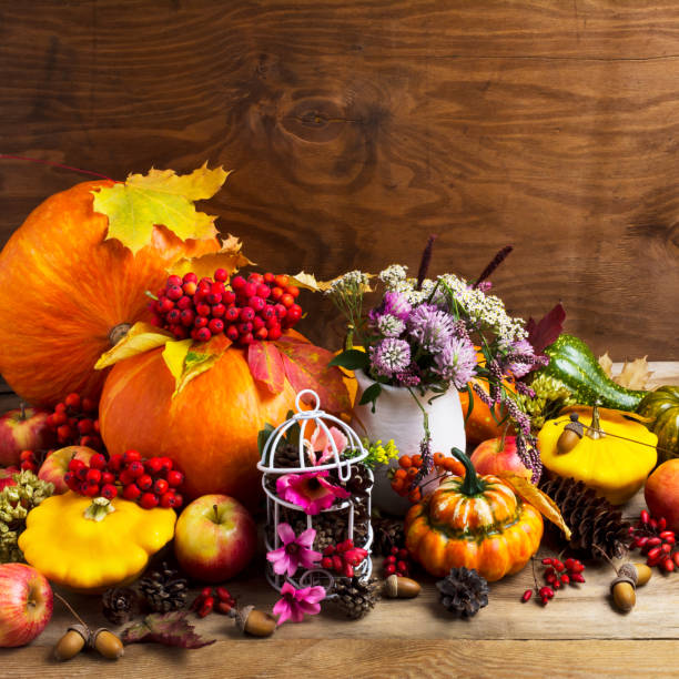 istock Fall arrangement with pumpkins and decorated birdcage, copy space 857901594