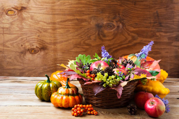 istock Fall wicker basket table centerpiece with blue flowers 857901620
