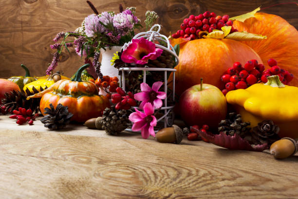 istock Fall table centerpiece with pink flowers decorated birdcage, copy space 857901756