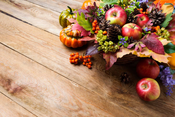 istock Thanksgiving or fall greeting with apples, rowan berries, copy space 857901854