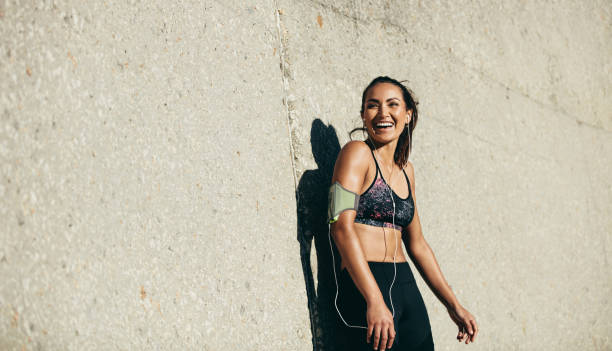 Healthy woman taking rest after training session