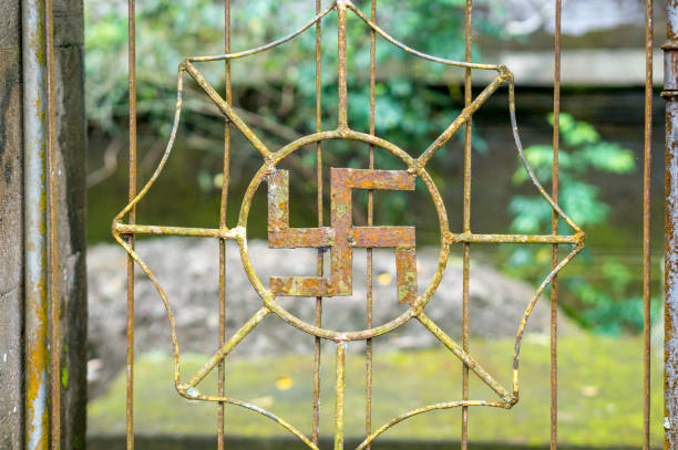 istock Hindu swastika on the door 857903670