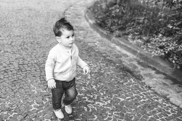 istock Cute little boy playing outdoor 857904828