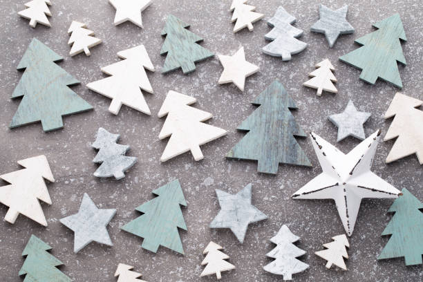 istock Christmas wooden decor on the snow background. 857913188