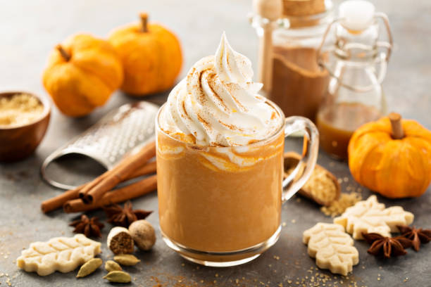 istock Pumpkin spice latte in a glass mug 857913464