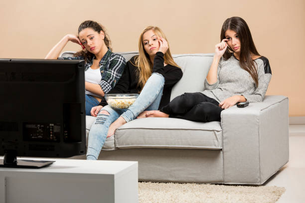 istock Watching sad movies 857915936