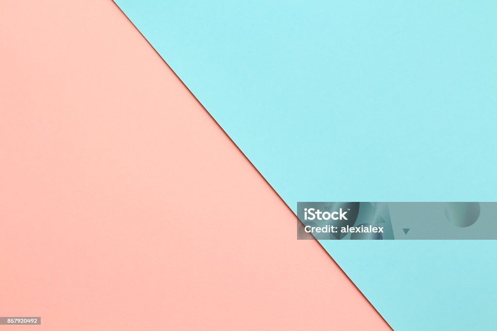 Abstract geometricpaper background in soft pastel pink and blue colors Abstract geometric water color paper background in soft pastel pink and blue trend colors with diagonal line. Backgrounds Stock Photo